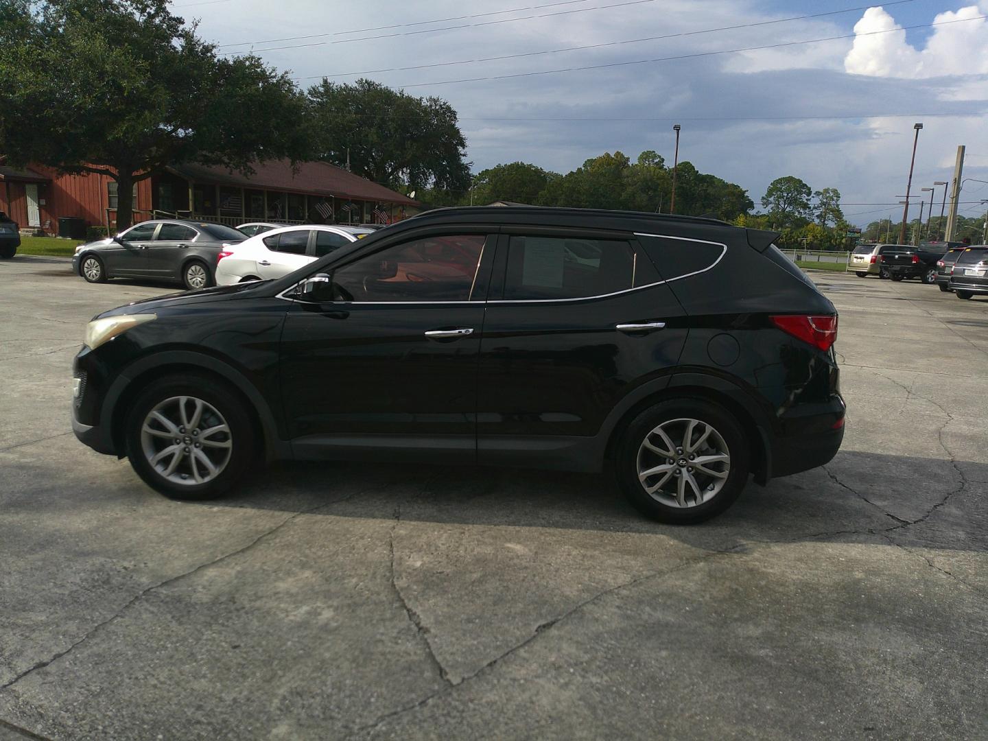 2014 BLACK HYUNDAI SANTA FE SPORT 2.0T (5XYZU3LA6EG) , located at 1200 Cassat Avenue, Jacksonville, FL, 32205, (904) 695-1885, 30.302404, -81.731033 - Photo#0